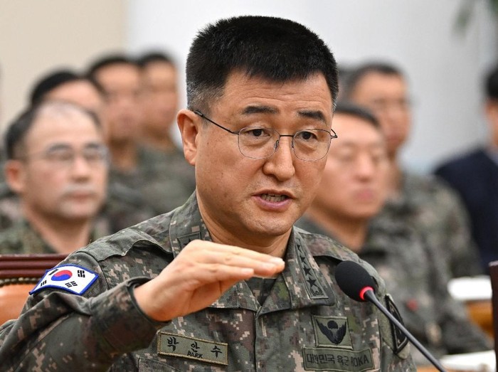 South Korea Army chief General Park An-su answers lawmakers questions during an emergency session of the parliamentary defence committee, where a question-and-answer session was held relating to President Yoon Suk Yeols declaration and lifting of martial law, at the National Assembly in Seoul on December 10, 2024. (Photo by Jung Yeon-je / AFP)