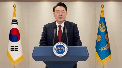 This handout photo taken on December 12, 2024 and released by the South Korean Presidential Office via Yonhap shows South Korean President Yoon Suk Yeol delivering an address at the Presidential Office in Seoul. South Korean President Yoon Suk Yeol on December 12, vowed to fight 