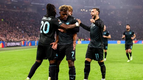 AMSTERDAM, NETHERLANDS - DECEMBER 12: Fisayo Dele-Bashiru of SS Lazio celebrates after scoring his teams second goal, Loum Tchaouna of SS Lazio, Taty Castellanos of SS Lazio during the UEFA Europa League 2024/25 League Phase MD6 match between AFC Ajax and SS Lazio at Johan Cruijff ArenA on December 12, 2024 in Amsterdam, Netherlands. (Photo by Pieter van der Woude/BSR Agency/Getty Images)