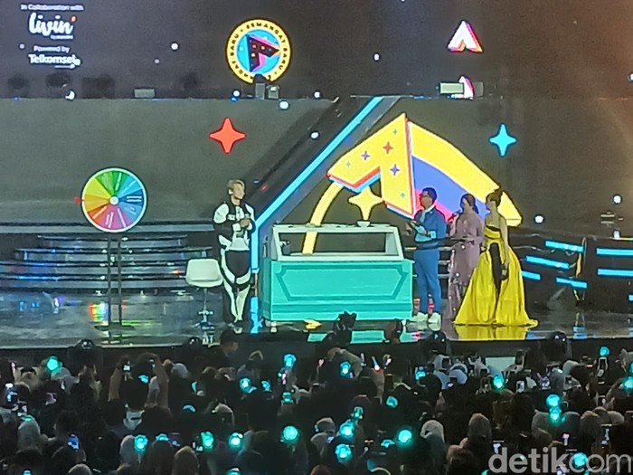 Minho SHINee di HUT ke-23 Transmedia, Minggu (15/12/2024).