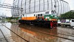 Penampakan Banjir Rob Rendam Perlintasan KRL di Dekat JIS