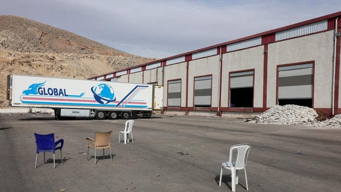 Fighters loyal to Syria's new ruling administration, inspect a building they claim to be a captagon factory, on the outskirts of Damascus, Syria, December 12, 2024. REUTERS/Mohamed Azakir
