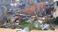 Mayotte juga menjadi jalur Siklon Chido dan menanggung beban terberat. (John Balloz/via REUTERS)  