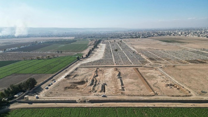A drone view shows the site of a mass grave from the rule of Syria's Bashar al-Assad, according to residents, after the ousting of al-Assad, in Najha, Syria, December 17, 2024. REUTERS/Ammar Awad