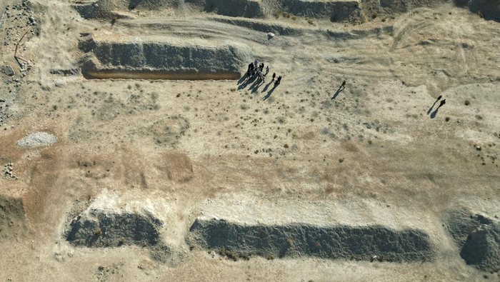 A drone view shows the site of a mass grave from the rule of Syrias Bashar al-Assad, according to residents, after the ousting of al-Assad, in Najha, Syria, December 17, 2024. REUTERS/Ammar Awad