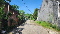 Gang atau jalan masuk ke Candi Badut. Dikatakan warga sekitar bahwa aksesnya belum pernah disentuh untuk perbaikan sejak belasan bahkan puluhan tahun.