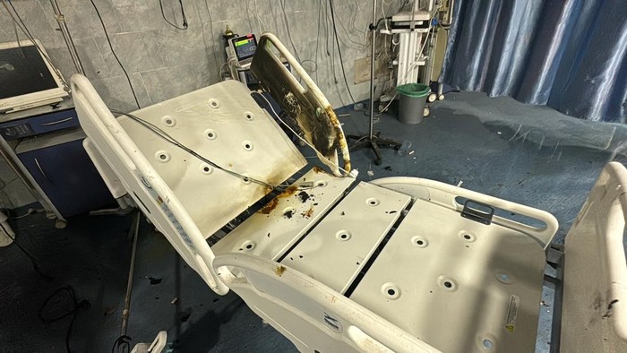 A bed is damaged inside Kamal Adwan hospital, during the ongoing Israeli military operation, amid Israel-Hamas conflict, in Beit Lahiya, in the northern Gaza Strip, December 18, 2024. REUTERS/Stringer