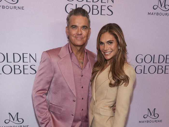 Robbie Williams, left, and Ayda Field Williams arrive at the Golden Globes first-time nominee celebration on Tuesday, Dec. 17, 2024, at The Maybourne Beverly Hills in Beverly Hills, Calif. (AP Photo/Chris Pizzello)