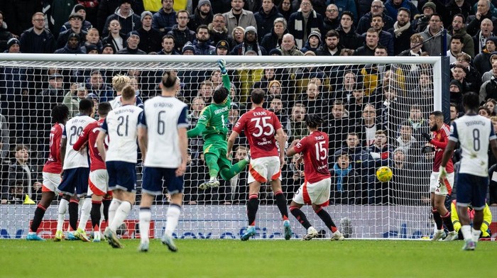 LONDON, ENGLAND - DECEMBER 19: Manchester Uniteds goalkeeper Altay Bayindir misses the ball and Tottenham Hotspurs Son Heung-Min (not shown) scores directly from a corner kick during the Carabao Cup Quarter Final match between Tottenham Hotspur and Manchester United at Tottenham Hotspur Stadium on December 19, 2024 in London, England. (Photo by Andrew Kearns - CameraSport via Getty Images)