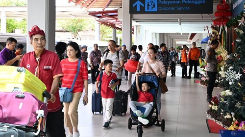 Penumpang di Bandara Internasional I Gusti Ngurah Rai, Bali, Jumat (20/12/2024). (Dok Kemenhub)