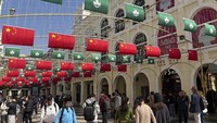 Wilayah administratif khusus ini kembali ke China pada 20 Desember 1999, dengan menerapkan kebijakan “satu negara, dua sistem” serupa dengan Hong Kong. (AP Photo/Kanis Leung)