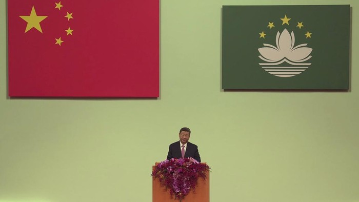 Chinese President Xi Jinping attends the inauguration of new Macau leader Sam Hou Fai, marking the 25th anniversary of Macao's handover from Portugal to China, in Macao, Friday, Dec. 20, 2024. (Justin Chan/Pool Photo via AP)