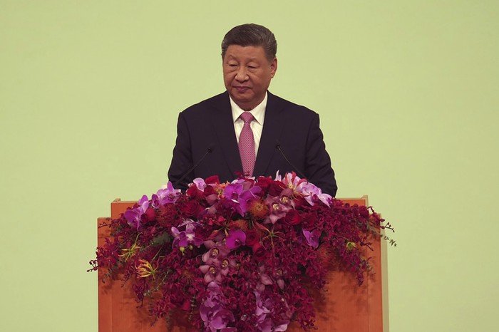 Chinese President Xi Jinping attends the inauguration of new Macau leader Sam Hou Fai, marking the 25th anniversary of Macaos handover from Portugal to China, in Macao, Friday, Dec. 20, 2024. (Justin Chan/Pool Photo via AP)