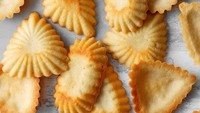 Rosettes ada Sandbakkelse di Norwegia. Kue kering ini disebut sebagai kukis tradisional di sana dan selalu ada saat Natal. Foto: Site Recipe/Culinary