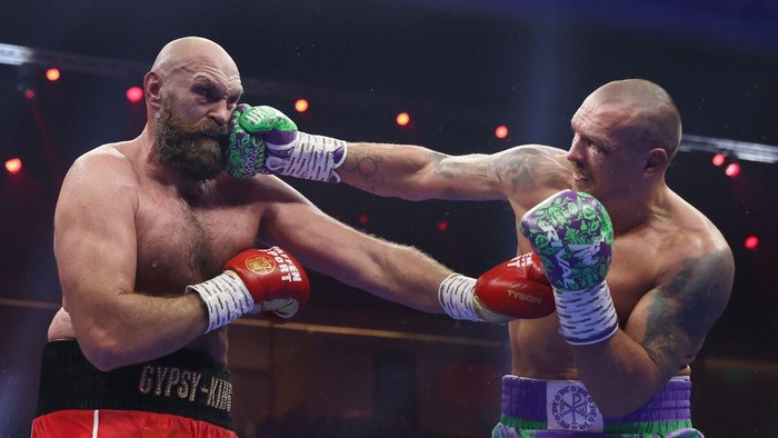 RIYADH, SAUDI ARABIA - DECEMBER 21: Oleksandr Usyk punches Tyson Fury during the IBF, IBO, WBA, WBC and WBO Undisputed World Heavyweight titles fight between Oleksandr Usyk and Tyson Fury as part of Oleksandr Usyk v Tyson Fury 2, Reignited card at Kingdom Arena on December 21, 2024 in Riyadh, Saudi Arabia. (Photo by Richard Pelham/Getty Images)