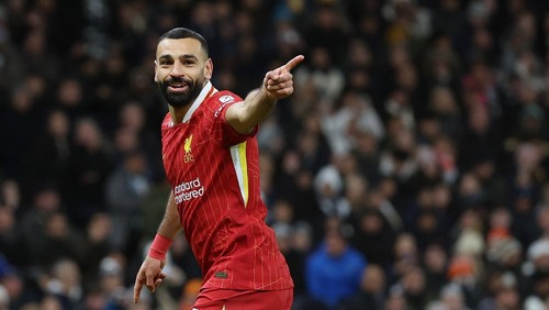LONDON, ENGLAND - DECEMBER 22: Mohamed Salah of Liverpool celebrates after scoring a goal to make it 1-5 during the Premier League match between Tottenham Hotspur FC and Liverpool FC at Tottenham Hotspur Stadium on December 22, 2024 in London, England. (Photo by Catherine Ivill - AMA/Getty Images)