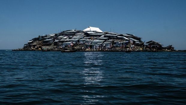 Pulau Migingo yang dihuni oleh penduduk yang sebagian besar mencari ikan nila di Danau Victoria di perbatasan Uganda dan Kenya.  (Photo by Yasuyoshi CHIBA / AFP/File Foto)