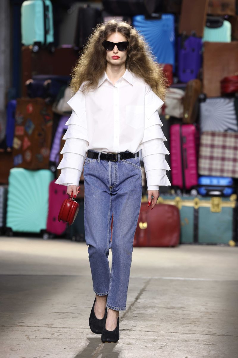 MILAN, ITALY - JUNE 14: A model walks the runway at the Moschino fashion show during the Milan Menswear Spring/Summer 2025 on June 14, 2024 in Milan, Italy. (Photo by Stefania D'Alessandro/WireImage)