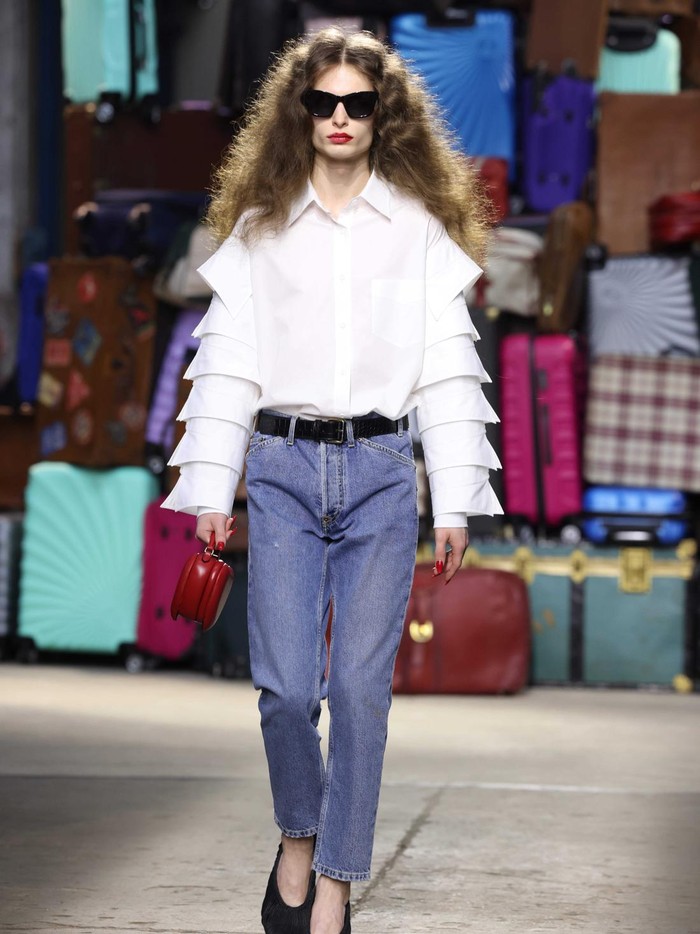 MILAN, ITALY - JUNE 14: A model walks the runway at the Moschino fashion show during the Milan Menswear Spring/Summer 2025 on June 14, 2024 in Milan, Italy. (Photo by Stefania DAlessandro/WireImage)