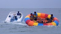 Pantai Tanjung Benoa yang terkenal dengan wahana water sport-nya bisa menjadi pilihan wisata mengisi libur akhir tahun.