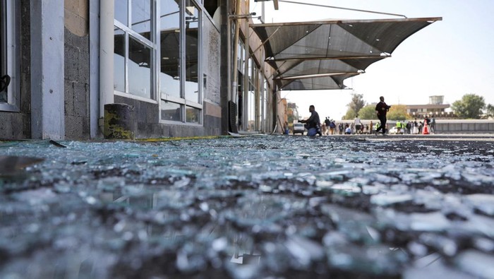 A man walks past a damaged building of Sanaa Airport, one day after Israeli airstrikes hit the airport, in Sanaa, Yemen, December 27, 2024. REUTERS/Khaled Abdullah