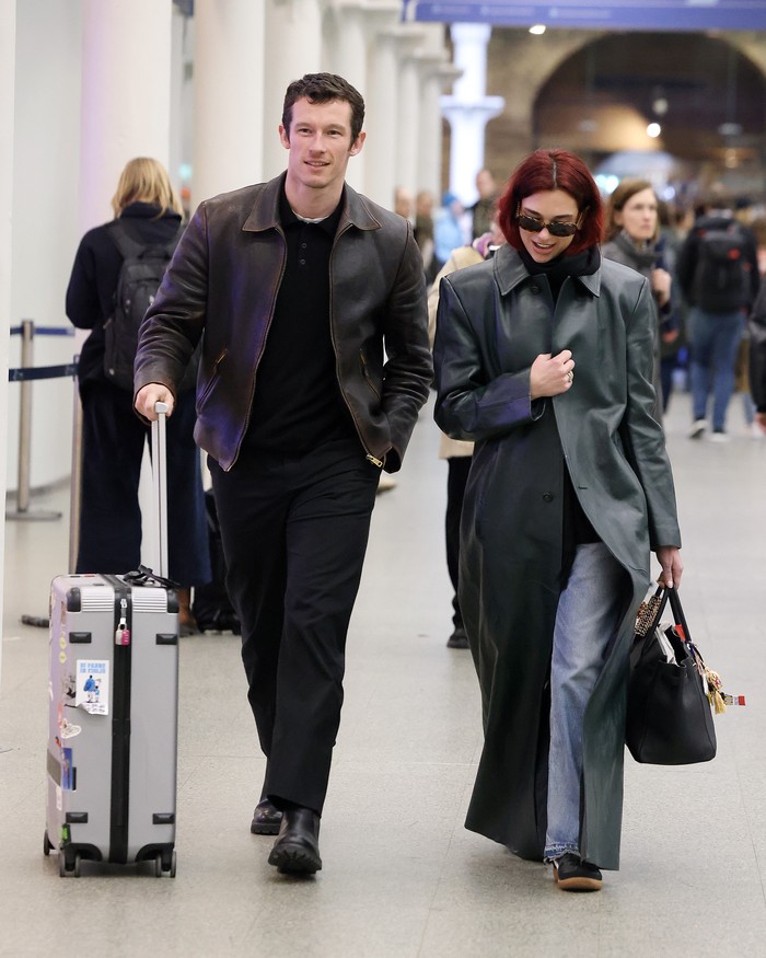 LONDON, ENGLAND - MARCH 26: Dua Lipa and Callum Turner arriving at London St Pancras Station after taking the Eurostar from Paris on March 26, 2024 in London, England. (Photo by Neil Mockford/GC Images)