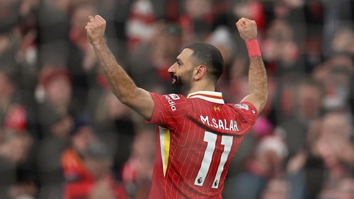 LIVERPOOL, ENGLAND - DECEMBER 26: Mohamed Salah of Liverpool celebrates scoring his teams third goal during the Premier League match between Liverpool FC and Leicester City FC at Anfield on December 26, 2024 in Liverpool, England. (Photo by Copa/Getty Images)
