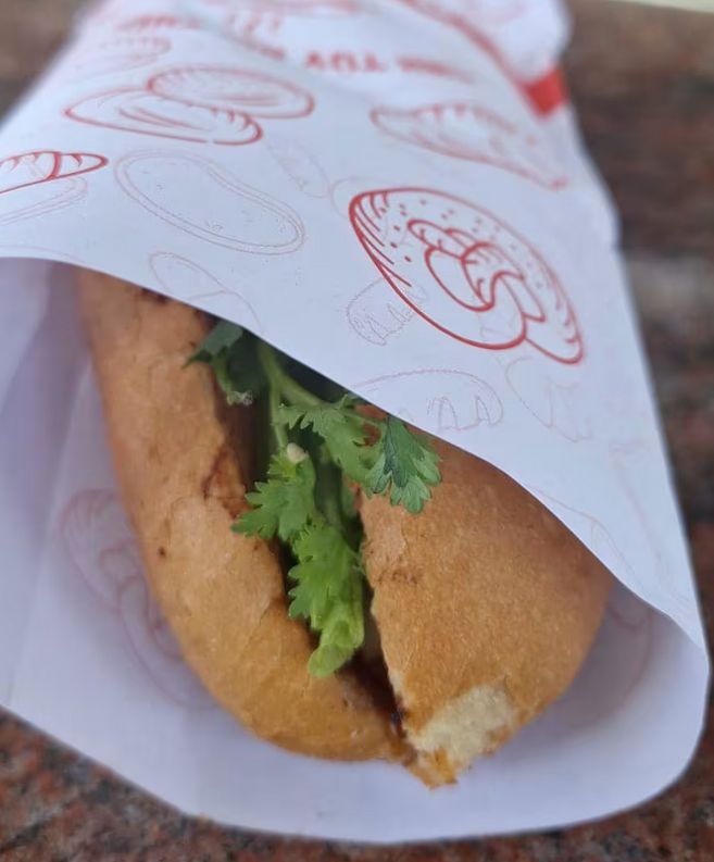 penjual banh mi seksi di Singapura