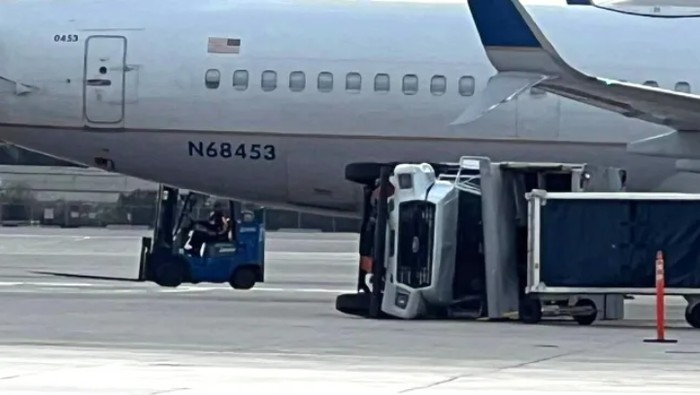 Pesawat menabrak truk hingga terbalik.