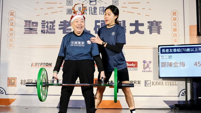 Cheng Chen Chin-Mei, 90, lifts 45kg as she breaks her personal record, at a weightlifting competition in Taipei, Taiwan December 21, 2024. REUTERS/Ann Wang TPX IMAGES OF THE DAY  REFILE - CORRECTING PRONOUN FROM 