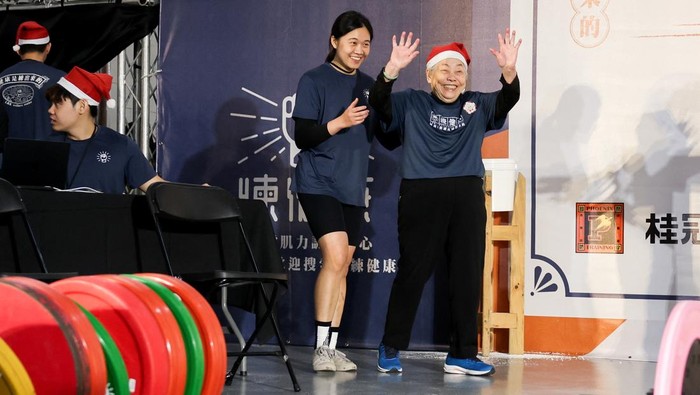 Cheng Chen Chin-Mei, 90, lifts 45kg as she breaks her personal record, at a weightlifting competition in Taipei, Taiwan December 21, 2024. REUTERS/Ann Wang TPX IMAGES OF THE DAY REFILE - CORRECTING PRONOUN FROM 