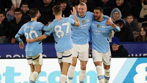 Soccer Football - Premier League - Leicester City v Manchester City - King Power Stadium, Leicester, Britain - December 29, 2024 Manchester Citys Erling Haaland celebrates scoring their second goal with Bernardo Silva, James McAtee and Kyle Walker Action Images via Reuters/Lee Smith EDITORIAL USE ONLY. NO USE WITH UNAUTHORIZED AUDIO, VIDEO, DATA, FIXTURE LISTS, CLUB/LEAGUE LOGOS OR LIVE SERVICES. ONLINE IN-MATCH USE LIMITED TO 120 IMAGES, NO VIDEO EMULATION. NO USE IN BETTING, GAMES OR SINGLE CLUB/LEAGUE/PLAYER PUBLICATIONS. PLEASE CONTACT YOUR ACCOUNT REPRESENTATIVE FOR FURTHER DETAILS..