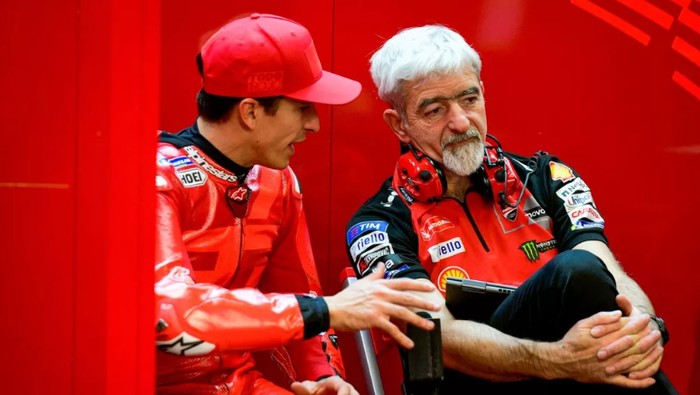 Marc Marquez dan Gigi DallIgna.