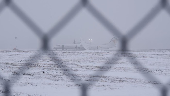 An Air Canada Express flight operated by Pal Airlines skidded off the runway Saturday night after catching fire at Halifax Stanfield International Airport is seen on Sunday, Dec. 29, 2024, in Halifax, Nova Scotia. (Darren Calabrese/The Canadian Press via AP)