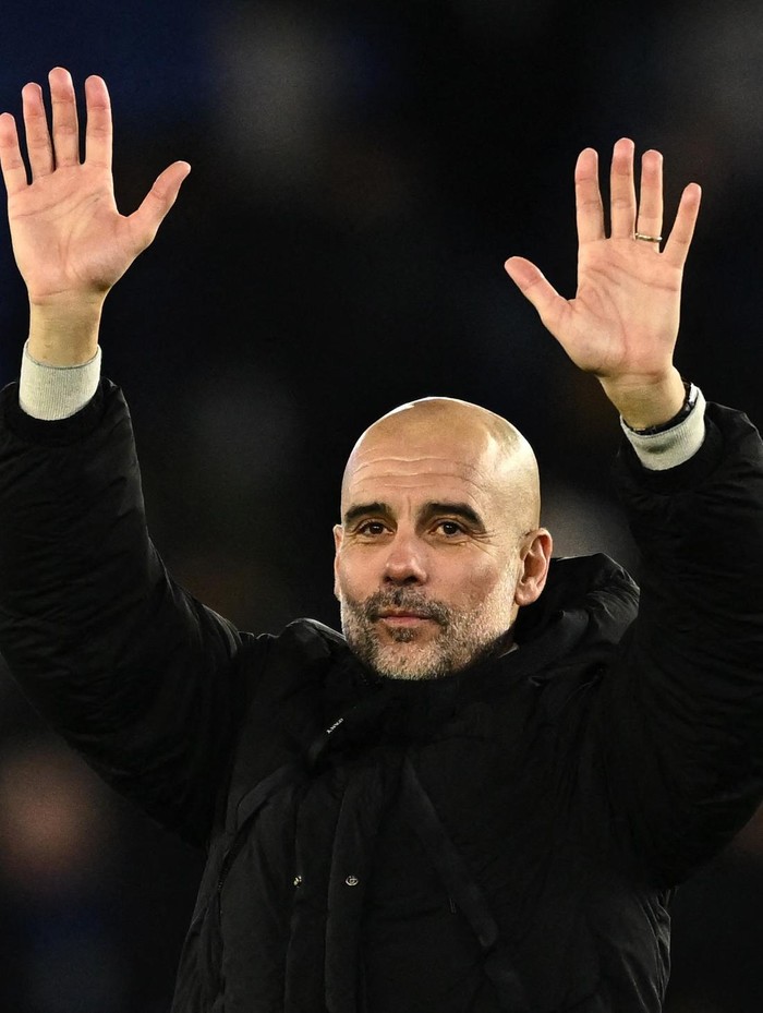 Pep Guardiola Soccer Football - Premier League - Leicester City v Manchester City - King Power Stadium, Leicester, Britain - December 29, 2024 Manchester City manager Pep Guardiola celebrates after the match REUTERS/Dylan Martinez EDITORIAL USE ONLY. NO USE WITH UNAUTHORIZED AUDIO, VIDEO, DATA, FIXTURE LISTS, CLUB/LEAGUE LOGOS OR LIVE SERVICES. ONLINE IN-MATCH USE LIMITED TO 120 IMAGES, NO VIDEO EMULATION. NO USE IN BETTING, GAMES OR SINGLE CLUB/LEAGUE/PLAYER PUBLICATIONS. PLEASE CONTACT YOUR ACCOUNT REPRESENTATIVE FOR FURTHER DETAILS..
