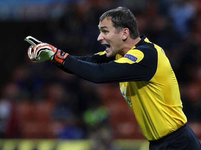 MILAN, ITALY - SEPTEMBER 20:  Sergei Ryzhikov of FC Rubin Kazan shouts to his team mates during the UEFA Europa League group H match between FC Internazionale Milano and FC Rubin Kazan at Giuseppe Meazza Stadium on September 20, 2012 in Milan, Italy.  (Photo by Marco Luzzani/Getty Images)