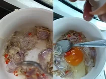 Gokil! Pekerja Ini Masak Nasi Goreng Ikan Bilis di Atas Tower Crane