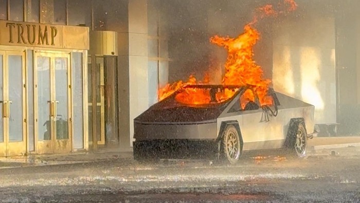 Flames rise from a Tesla Cybertruck after it exploded outside the Trump International Hotel Las Vegas, in Las Vegas, Nevada, U.S., January 1, 2025 in this screengrab taken from a social media video. Alcides Antunes/via REUTERS  THIS IMAGE HAS BEEN SUPPLIED BY A THIRD PARTY. MANDATORY CREDIT. NO RESALES. NO ARCHIVES. THIS PICTURE WAS PROCESSED BY REUTERS TO ENHANCE QUALITY. AN UNPROCESSED VERSION HAS BEEN PROVIDED SEPARATELY.      TPX IMAGES OF THE DAY