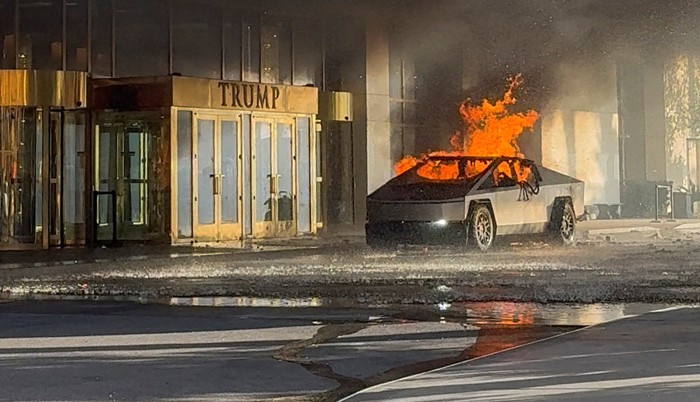 Flames rise from a Tesla Cybertruck after it exploded outside the Trump International Hotel Las Vegas, in Las Vegas, Nevada, U.S., January 1, 2025 in this screengrab taken from a social media video. Alcides Antunes/via REUTERS  THIS IMAGE HAS BEEN SUPPLIED BY A THIRD PARTY. MANDATORY CREDIT. NO RESALES. NO ARCHIVES. THIS PICTURE WAS PROCESSED BY REUTERS TO ENHANCE QUALITY. AN UNPROCESSED VERSION HAS BEEN PROVIDED SEPARATELY.      TPX IMAGES OF THE DAY