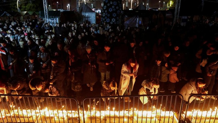 People light candles during a vigil after a man in Cetinje shot dead people in a rampage, in Podgorica Montenegro, January 2, 2025. REUTERS/Stevo Vasiljevic TPX IMAGES OF THE DAY