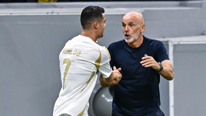 Cristiano Ronaldo of Al Nassr FC celebrates with Head Coach Stefano Pioli after scoring a goal during the AFC Champions League elite west football match between Qatars Al Gharafa SC and Saudi Arabias Al Nassr FC at Al-Bayt Stadium in Al Khor, Qatar, on November 25, 2024. (Photo by Noushad Thekkayil/NurPhoto via Getty Images)