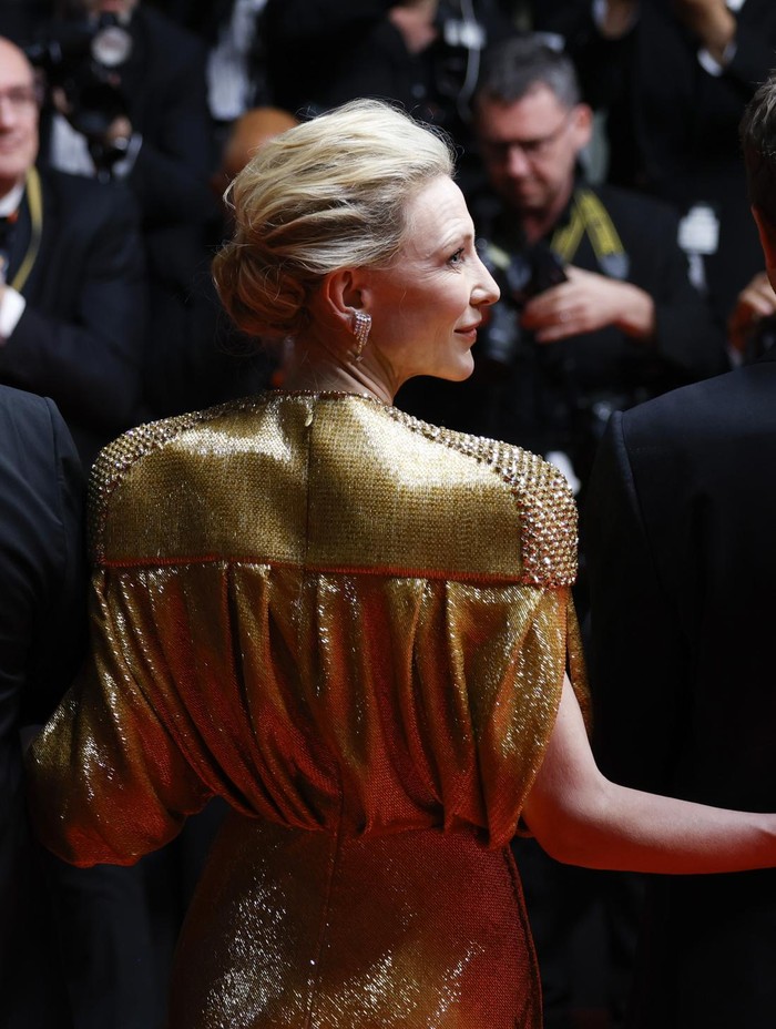 Denis Menochet, from left, Cate Blanchett, and director Evan Johnson pose for photographers upon arrival at the premiere of the film 'Rumours' at the 77th international film festival, Cannes, southern France, Saturday, May 18, 2024. (Photo by Millie Turner/Invision/AP)