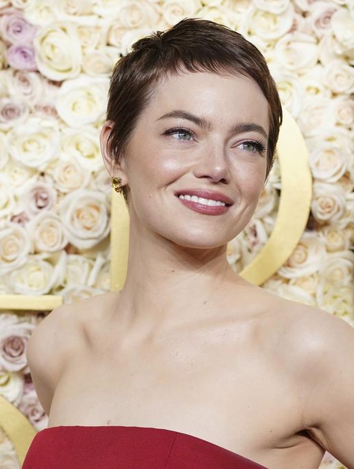 Emma Stone arrives at the 82nd Golden Globes on Sunday, Jan. 5, 2025, at the Beverly Hilton in Beverly Hills, Calif. (Photo by Jordan Strauss/Invision/AP)