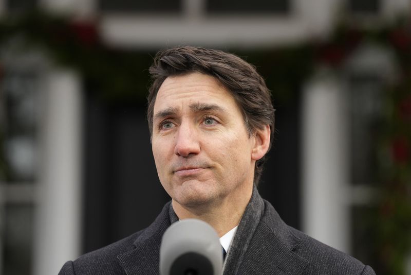 Prime Minister Justin Trudeau makes an announcement outside Rideau Cottage in Ottawa on Monday, Jan. 6, 2025. (Adrian Wyld/The Canadian Press via AP)