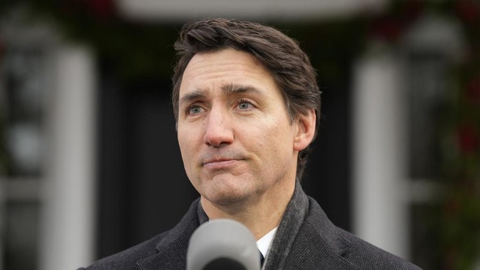 Prime Minister Justin Trudeau makes an announcement outside Rideau Cottage in Ottawa on Monday, Jan. 6, 2025. (Adrian Wyld/The Canadian Press via AP)