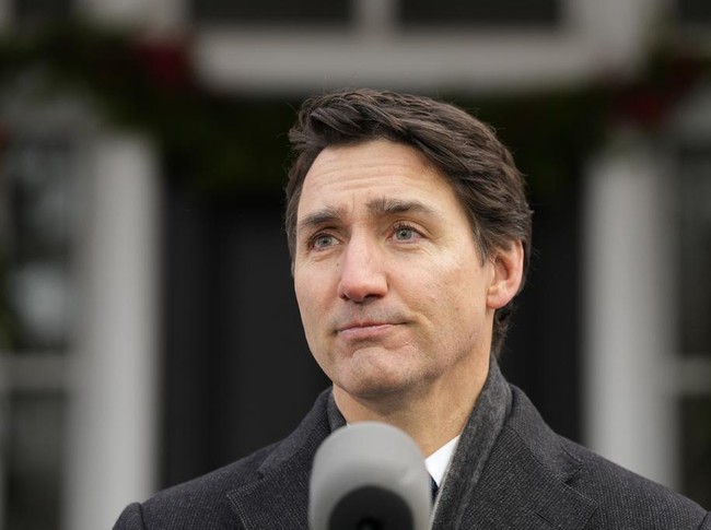 Prime Minister Justin Trudeau makes an announcement outside Rideau Cottage in Ottawa on Monday, Jan. 6, 2025. (Adrian Wyld/The Canadian Press via AP)