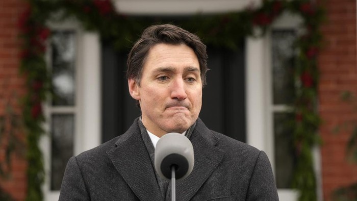 Prime Minister Justin Trudeau makes an announcement outside Rideau Cottage in Ottawa on Monday, Jan. 6, 2025. (Adrian Wyld/The Canadian Press via AP)