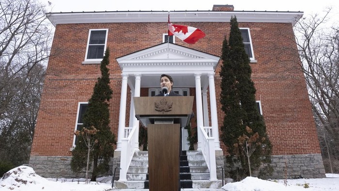 Prime Minister Justin Trudeau makes an announcement outside Rideau Cottage in Ottawa on Monday, Jan. 6, 2025. (Adrian Wyld/The Canadian Press via AP)