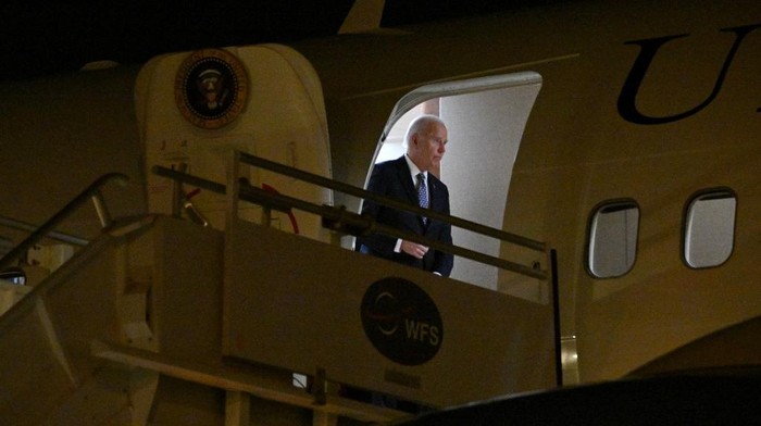 US President Joe Biden steps off Air Force One at Los Angeles International airport (LAX) on January 6, 2025. (Photo by ROBERTO SCHMIDT / AFP)