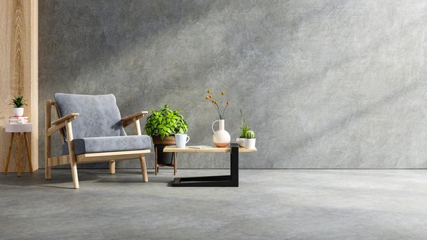 Armchair and a wooden table in living room interior with plant,concrete wall.3d rendering